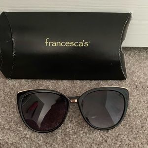Francesca’s black sunglasses